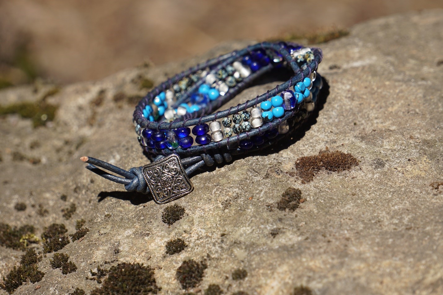 sliver button, navy blue leather
